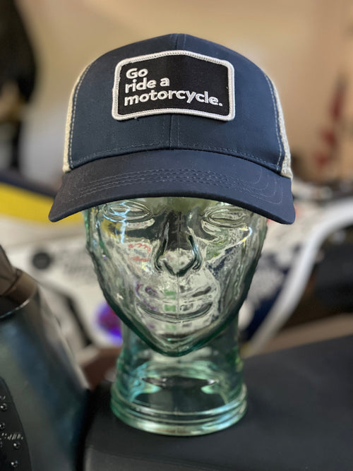"Go ride a motorcycle" Organic Recycled Trucker Hat